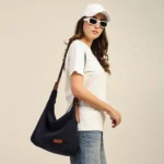 Front – Dark Blue Carol Canvas Crossbody Bag front view stylish sling bag design